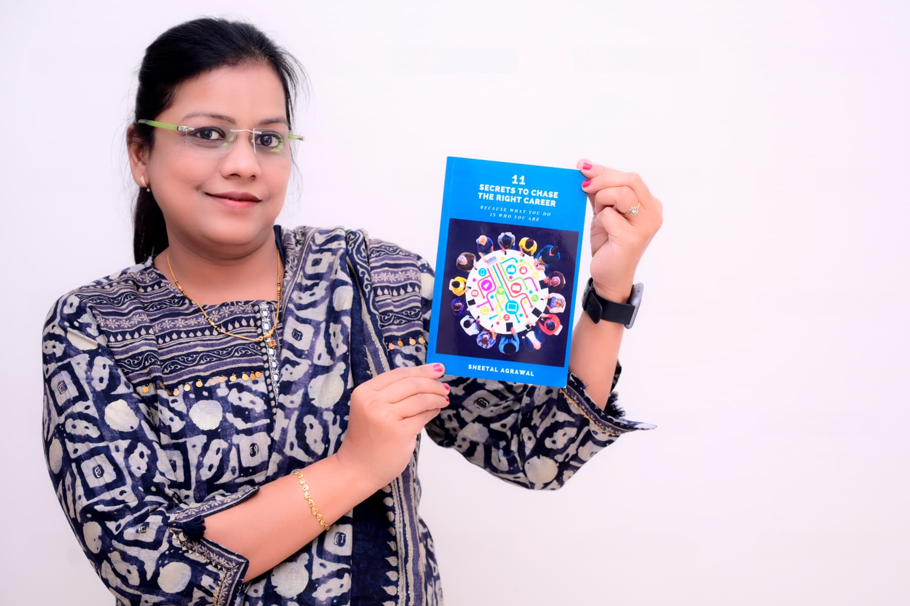 Mrs. Agrawal With Book